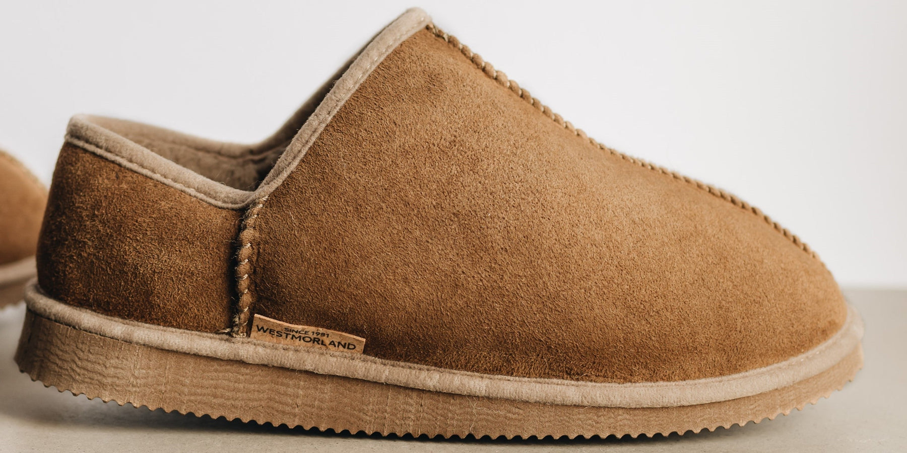 What is the best way to clean Sheepskin Slippers?