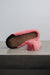 Pink curly sheepskin slippers with a beige suede sole