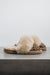 Side view of Veronica Leopard Sheepskin Slippers on Concrete Surface. Made from 100% soft  merino sheepskin
