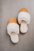 Birds eye view of Veronica Mel Sheepskin Slippers on Concrete Surface