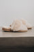 Shearling Sheepskin Slipper For Women Backless Mules - Side view of Veronica Vanilla Sheepskin Slippers on Concrete Surface