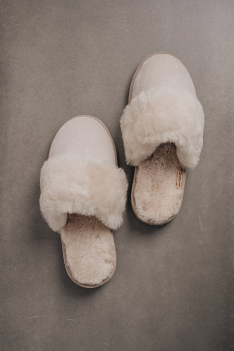 Birds eye view of Veronica Vanilla Sheepskin Slippers on Concrete Surface