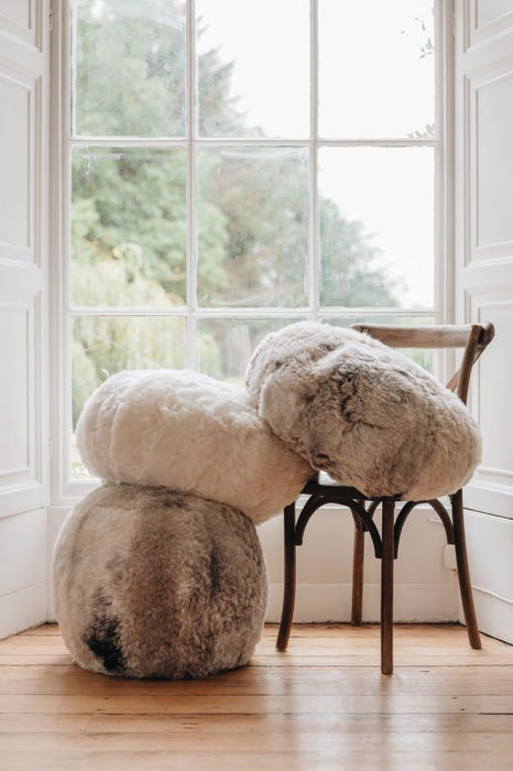 Ottoman and Floor Cushions in white and melange sheepskins