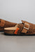 Close up on lyra Sahara cork soul and buckle as well as the heaton detailing tab and adjustable strap