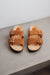 Front of sandals with dyed sheepskin to turn it a rust color