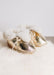 Westmorland Sheepskins Soft Soled Orange foil Baby Sheepskin Boots with a dyed Orange Sheepskin Cuff and laces.