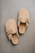 Birds eye view of curly sheepskin mule with adjustable strap 