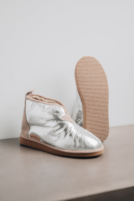 Erin Sheepskin silver slipper with hard sole for women.