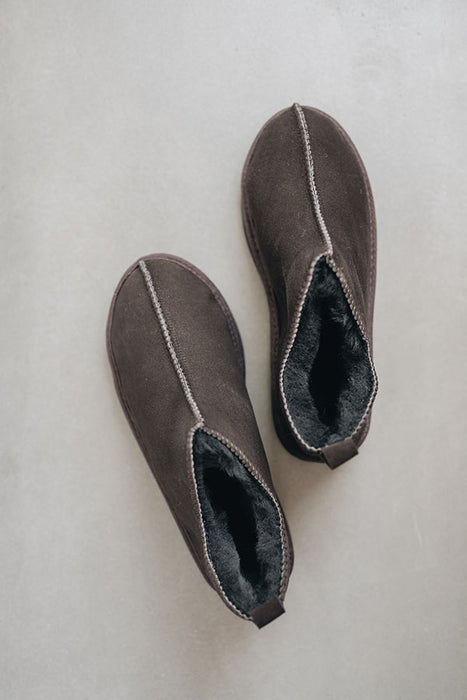 Birds eye view of Henry ankle-high sheepskin slipper showing plush natural sheepskin wool inside