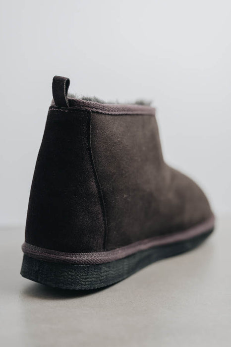 Close up view of Noah dark brown Sheepskin Slippers detailing the suede panel on the heel