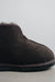 Close up view of Noah dark brown Sheepskin Slippers showing the detail and cotton binding on the front of the slipper.