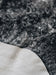 Detail of a Gotland curly natural grey rug 