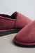 Close up of Bordeaux coloured loafer style sheepskin slipper