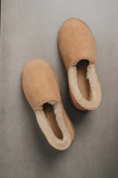 Birds eye view of clean loafer style sheepskin slipper, hand crafted from Spanish merino sheepskin.