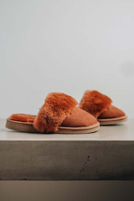 Women’s sheepskin slippers with soft natural wool lining  - slip on mule style. Veronica in a rust colour.