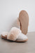 Warmest slippers for women made from sheepskin