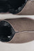 Close up of brown coloured slip on style sheepskin slipper 