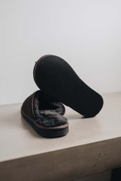 Bottom view showing the sole of the brown women's sheepskin mule slipper called Willow