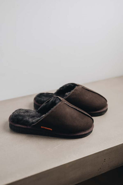 Side view of the brown women's sheepskin mule slipper called Willow.